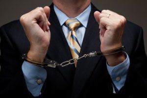 Man charged with white collar crime in Rhode Island.